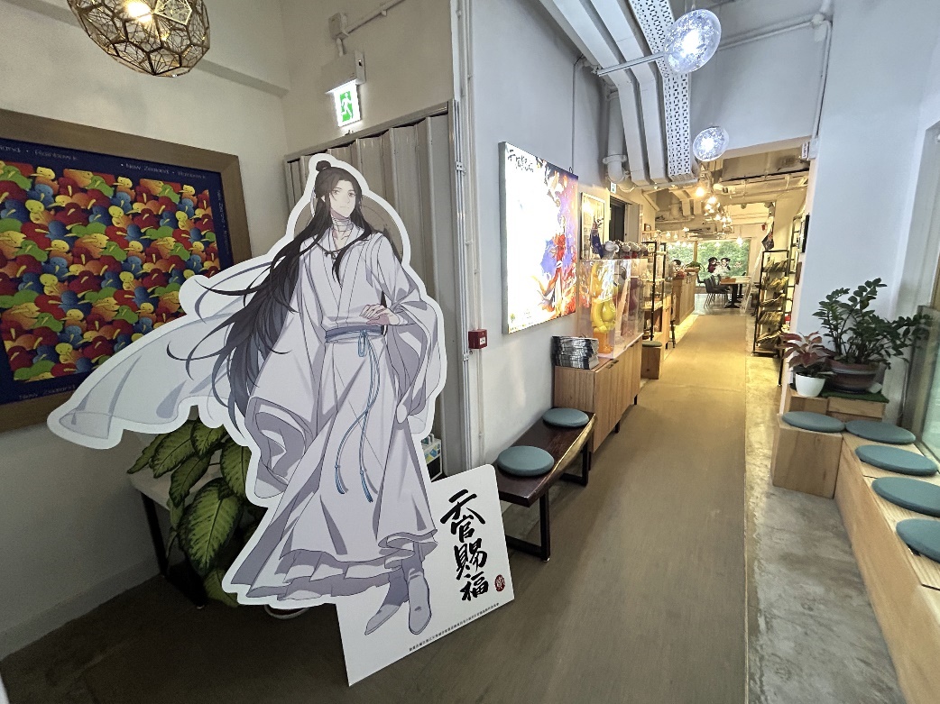 A room with a large poster
Description automatically generated with medium confidence